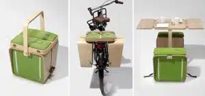 Un panier de pique-nique qui tient sur un vélo et se transforme en table