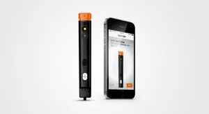 Un petit objet anti-agression avec alarme, spray, prise de photos et un bouton pour appeler la police