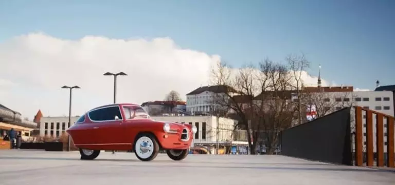 Un voiture vintage à trois roues entièrement électrique