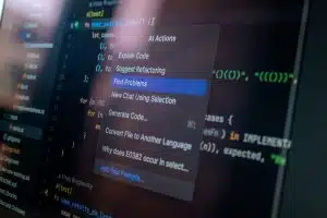 Productivité et IA : vers une nouvelle organisation du travail Computer screen displaying code with a context menu.